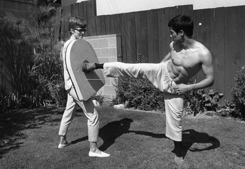 Bruce Lee martial arts training kicking sparring