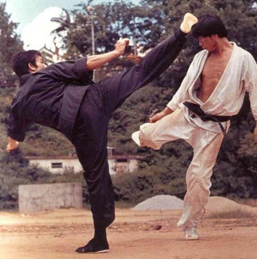 Bruce Lee power strength kicking someone in the head