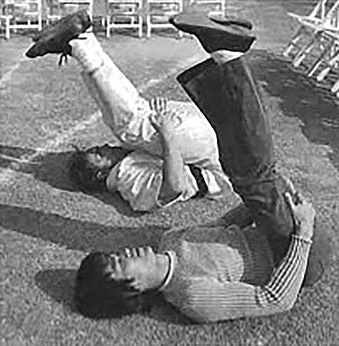 Bruce Lee stretching routine Bruce Lee flexibility warmup with martial arts student